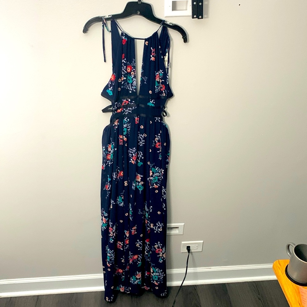 Floral floor length dress. Wedding guest attire. Cut out neckline and open back.